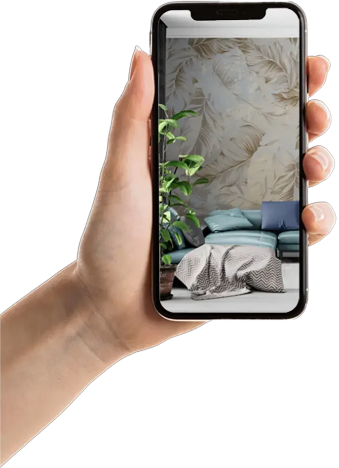 ruka koja drži telefon i fotografiše zid sa tapetom